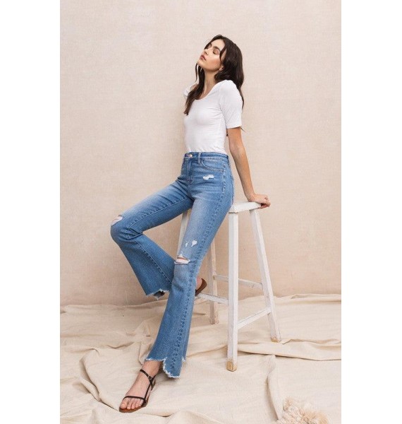 Mid Rise Flare Denim With Hem Detail